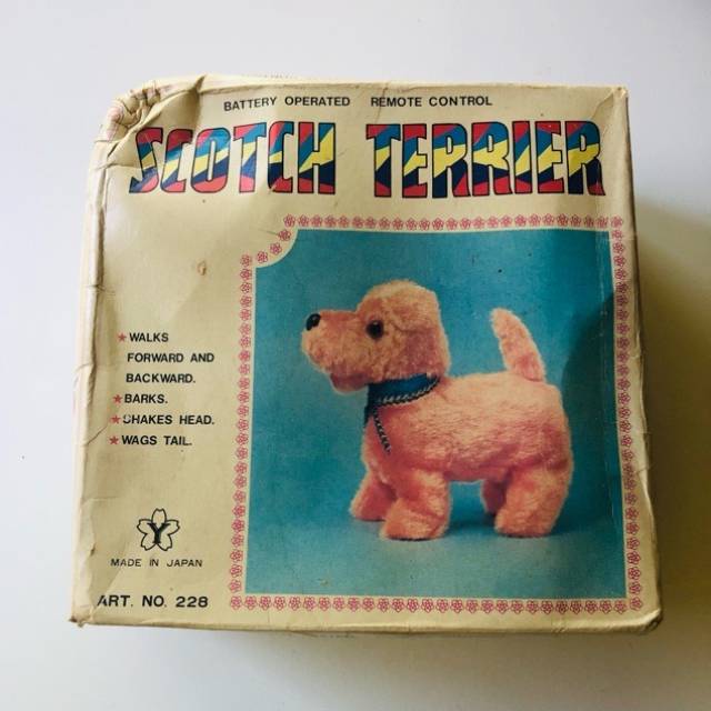 Scotch Terrier Battery Operational brown dog...