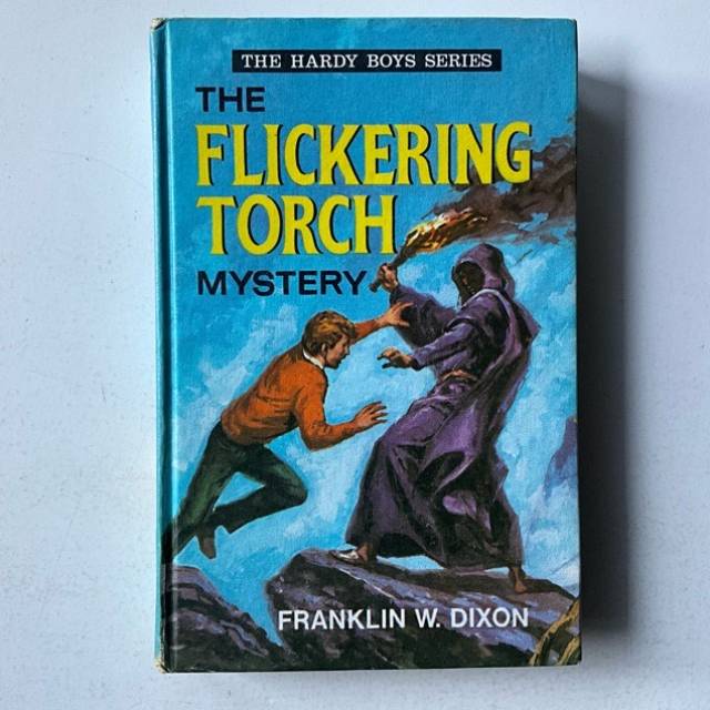 THE HARDY BOYS SERIES - THE FLICKERING TORCH...