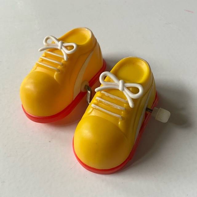 Yellow Pair Of Wind Up Walking Shoes Toy 198...